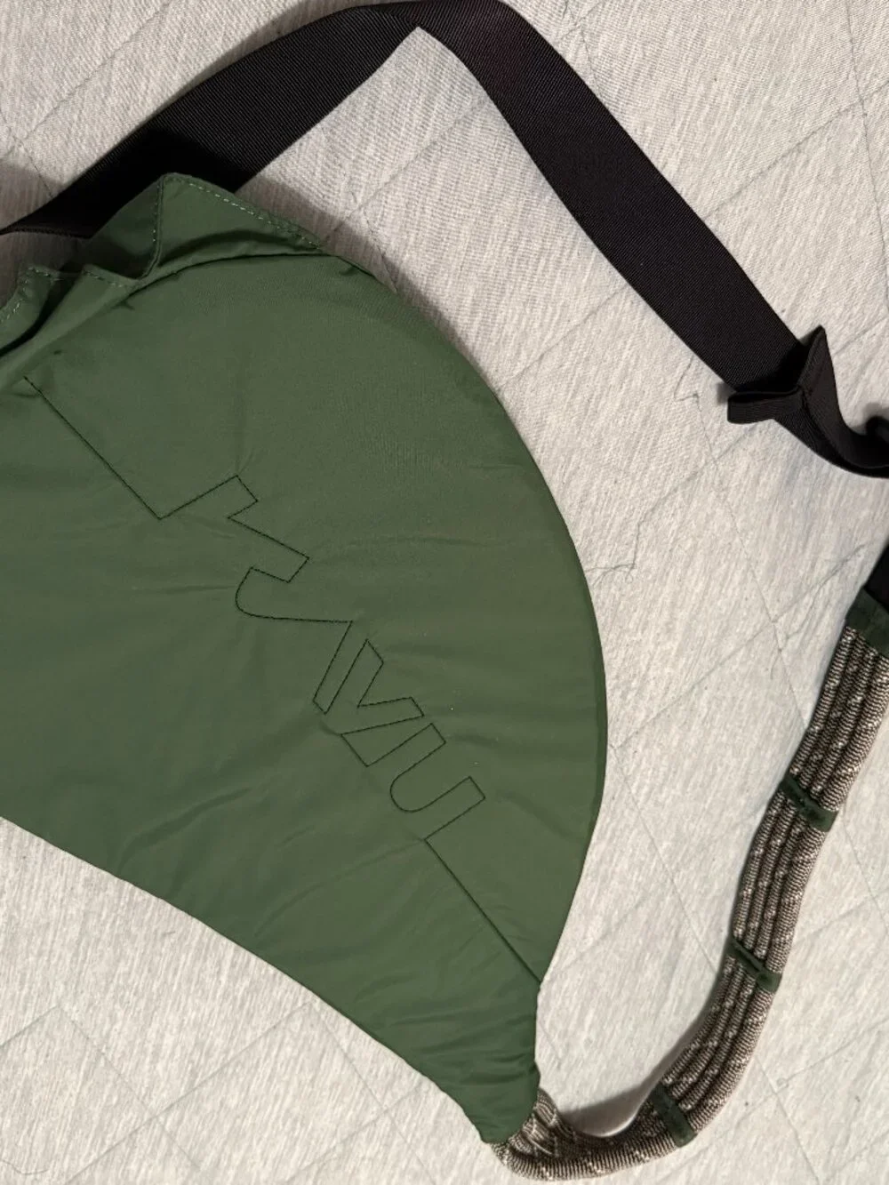 KAVU Rope Sling crossbody bag in a solid green colorway